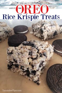 oreo rice krispie treats on a baking sheet with cookies and oreos in the background