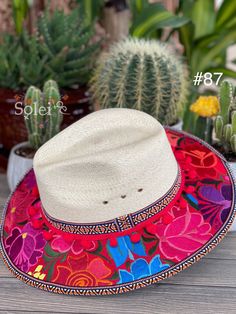 This beautiful Mexican Fedora is made out of Palm and has beautiful embroidered flowers. It is perfect to add that special touch to any outfit. The hat itself is made out of Palm and is very light and breathable. Find more colors here: https://www.etsy.com/es/listing/1004902053/sombrero-mexicano-de-palma-sombrero?ref=listing_published_alert Mexican Palm, Mexican Top, Mexican Sombrero, Frida Kahlo Style, Mexican Fashion, Two Piece Jumpsuit, Floral Hat, Traditional Mexican, Embroidered Hat