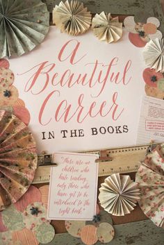 a beautiful career in the books sign surrounded by paper fans