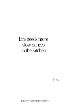 a white book cover with the words life needs more slow dances in the kitchen