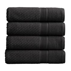 three black towels stacked on top of each other