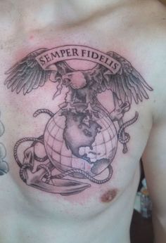 a man with a tattoo on his chest has an eagle around the globe and is saying semper fidiis