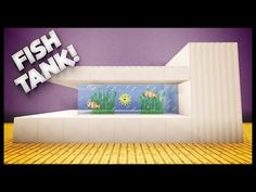 a fish tank in the middle of a room with purple walls and wood flooring