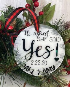 a christmas ornament that says he used she said yes