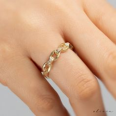 "Discover timeless elegance with our exquisite Chain-Link Diamond Ring, available in both 14k and 18k gold options. The distinctive chain-shaped design is adorned with natural diamonds, creating a luxurious and chic accessory. Elevate your style with this handcrafted masterpiece, perfect for special occasions or everyday luxury. Explore the unique blend of modern design and classic sophistication in our customizable diamond ring collection. F E A T U R E S 💎 D I A M O N D Carat: 0.06 Quality: VS1 Color: F-G Cut: Round 🌟 M A T E R I A L Gold: Available in 14K and 18K Options Color: Choices of White, Rose, or Yellow 🎁 Extra Touch: As a testament to our dedication to exceptional customer service, each purchase is accompanied by a complimentary product certificate. Your order will be elegan Elegant White Gold Diamond Chain Ring, Elegant Chain Link Chain Ring For Promise, Elegant 14k Gold Chain Link Ring, Elegant Yellow Gold Chain Ring With Solid Link, Luxury White Gold Chain Ring For Wedding, Elegant Diamond Chain Link Ring, Diamond Chain Link Ring In White Gold, White Gold Diamond Chain Link Ring, Elegant Diamond Chain Ring