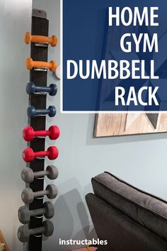 a gym rack with dumbbells in it and the words home gym dumbbell rack