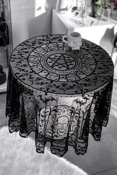 ASRA.- Statement custom black lace tablecloth.- All over print featuring leaves, skulls, pentagrams, bats and more.- Scalloped edge.- Circular design.- Width 169cm/66,5"- Length 166cm/65.3"With KILLSTAR branding, 100% Polyester. Hand wash only / Do not bleach / Do not tumble dry / Do not iron / Do not dry clean. Imported. White Lace Over Black Tablecloth, Killstar Bedroom, Witchy Table Cloth, Killstar Decor, Goth Tablecloth, Bed Inspo, Gas Monkey Garage, Black Label Society, West Coast Choppers