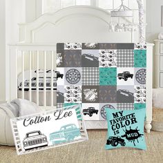 a baby crib bedding set with cars and trucks