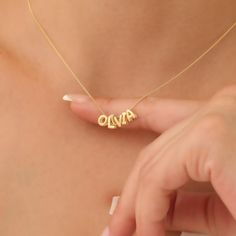 14k Gold 3D Bubble Letter Name Necklace Material: High Quality Solid 925 Sterling Silver THICK plating of 14k Gold, Rose Gold, or Rhodium (Silver) Chain includes a 2" extension for adjustable fit Hollow back design ♡ The most unique jewelry you can find, perfect as a gift for yourself or a loved one. ♡ All of our jewelry is handcrafted with enthusiasm and great care in our workshop. ► How to Order Simply use the 'PERSONALIZATION BOX' to specify the LETTER you would like. Letters are written in uppercase only. ► How to Care for Your Jewelry Maintain your jewelry's high shine by avoiding contact with chemicals such as soap, perfume, lotion, makeup, hair products, and cleaning products. Storing your jewelry in a pouch or box after use will prolong its life. Not recommended for sensitive and a Hallmarked Yellow Gold Name Necklace For Birthday, Hallmarked Name Pendant Necklace For Mother's Day, Hallmarked Pendant Name Necklace For Mother's Day, Mother's Day Hallmarked Name Necklace Pendant, Gift 14k Stamped Pendant Name Necklace, Custom Gold Sterling Silver Necklace For Birthday, Sterling Silver Yellow Gold Necklace For Birthday, Sterling Silver Necklace In Yellow Gold For Birthday, Yellow Gold Sterling Silver Necklace For Birthday