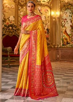 This exquisite Woven Banarasi Saree epitomizes timeless elegance and rich heritage. Crafted with intricate zari work, the luxurious silk fabric shimmers with every movement. Perfect for weddings and grand celebrations, it showcases a blend of traditional craftsmanship and contemporary design. Drape yourself in this regal masterpiece for an unforgettable, sophisticated look. --------------------------------- S A R E E ● D E T A I L S --------------------------------- ● Fall and Edging : Done ● Tassel : See in Option ● Petticoat : On request Extra Charges ● Drapping Saree (Ready to wear) : On Request Extra Charges ● Blouse : Matching Unstitched Piece (See in option) ● Occasion : Wedding, Party, Festive, Function ● Type: Bollywood ● Includes : 1 Saree, 1 Blouse Piece ● Saree length : 5.5 mete Drapping Saree, Classic Saree, Yellow Saree, Weaving Designs, Banarasi Silk Saree, Half Sleeve Blouse, Party Kleidung, Banarasi Saree, Zari Work