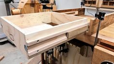 a workbench with lots of wood in it