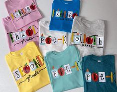 "Welcome to Cotton and Pearls Vinyl! Let's get the kiddos ready for school with a new tee! These unisex fit tees come with the grade of your choice as shown above. Choose from cursive or print for the word \"grade\". All designs are hand pressed with professional grade heat transfer vinyl. Unisex toddler or youth T-shirt with several grade options! Please leave shirt color in the personalization box. Sizes 2T-7 Youth XS-XL See listing photos for color charts." Multicolor Letter Print T-shirt For School Events, Back To School T-shirt With Heat Transfer Vinyl, School Spirit Tops With Name Print For School Events, School T-shirt With Heat Transfer Vinyl, School Spirit Cotton Shirt, Cotton School Spirit Shirt For School, School Spirit Short Sleeve T-shirt, School Short Sleeve T-shirt For Spring, Spring School Short Sleeve T-shirt