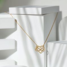 Product Details Show your eternal love with this Heart Infinity Pendant, heart and infinity frames are beautifully stuck together. Infinity is adorned with Brilliant Round Diamonds enhancing the sparkles of the Forever Love Charm Pendant. We craft this piece in Gold, which makes a wonderful valentines gift for women. Product Information SKU SHP-PENDANT121911717 Length 13.5 mm Width 20 mm Weight 2.49 gm (Approximate) DIAMOND INFORMATION No.of Stones 27 Pieces Total Weight 0.26 Carat (Approximate) Luxury Infinity Shaped Elegant Jewelry, Luxury White Gold Infinity Jewelry, Luxury Open Heart Fine Jewelry Necklace, Luxury Open Heart Fine Jewelry, Luxury Diamond Infinity Jewelry, Heart And Infinity, Stuck Together, Necklace With Diamond, Infinity Design