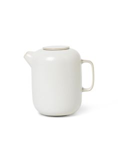 a white tea pot with a handle on the top and bottom, sitting in front of a white background