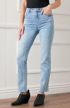 Frayed raw hems, fading and whiskering give these stretch-kissed jeans a well-loved vibe that will make them an instant favorite. 30" inseam; 15 3/4" leg opening; 11 3/8" front rise; 15" back rise (size 8) 93% cotton, 5% polyester, 2% spandex Machine wash, tumble dry Imported Straight Cropped Jeans With Frayed Hem In Medium Wash, Medium Wash Straight Cropped Jeans With Frayed Hem, Denim Blue Straight Flare Jeans With Frayed Hem, Washed Blue Straight Leg Jeans With Frayed Hem, Spring Straight Bottoms With Frayed Hem, Straight Bottoms With Frayed Hem For Spring, Washed Blue Straight Leg Cropped Jeans With Frayed Hem, Medium Wash Straight Leg Jeans With Frayed Hem, Straight Leg Medium Wash Jeans With Frayed Hem