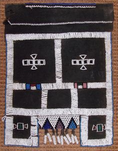 a piece of cloth with different designs on it