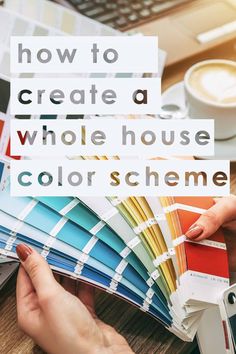 a person holding a color swatch with the words how to create a whole house color scheme