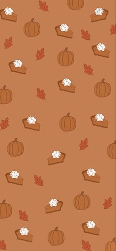 an orange background with pumpkins and other autumn items on it, including marshmallows