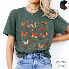 Autumnal Butterflies Unisex Tee Shirt | Nature Shirt | Boho Tee | Cottagecore Clothing  ✔️ Soft, light and comfortable unisex short sleeve tee ✔️ 100% Airlume combed and ringspun cotton (fiber content may vary for different colours*) ✔️ Light fabric (4.2 oz/yd² (142 g/m ✔️ Retail fit 📏 Runs true to size ✔️ Dual side seams for structural support of the garment help hold its shape longer ✔️ Ribbed knit elastic collars to bolster shaping, twill taped shoulders to prevent stretching and for better Fall Crew Neck T-shirt With Mushroom Print, Cottagecore Aesthetic Clothes, Casual Spring T-shirt With Mushroom Print, Fall Mushroom Print Graphic T-shirt, Multicolor Casual T-shirt With Butterfly Print, Cottagecore Clothes, Boho Tees, Casual Multicolor Butterfly Print T-shirt, Nature Shirts