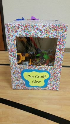 the candy claw box is decorated with sprinkles