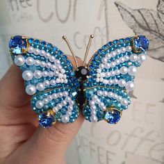 This handmade butterfly brooch is the perfect gift for mom. it will surely be stored and worn for many years. The blue handmade butterfly brooch is very beautifully shiny. This jewelry is an exclusive gift! Can be worn over a scarf, coat, sweater and blouse for a holiday or every day. Handmade Blue Wedding Brooches, Elegant Blue Butterfly Brooches, Elegant Blue Beaded Brooches, Blue Brooch Pins As A Gift, Blue Brooch Pin As Gift, Blue Brooch Pins For Gift, Handmade Blue Brooches For Party, Blue Brooch Pin For Gift, Handmade Turquoise Brooches As Gift