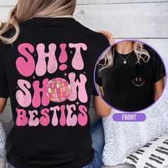 Retro Show Besties Shirt, Best Friend Shirts, Disco Ball Shirt, Matching Best Bitches Friends shirt, Sisters Shirt, Bestie Best friends Shirt The Standard T-Shirt, personalized to suit your individual style, serves as the perfect medium for self-expression. Made from 100% preshrunk cotton, this timeless short-sleeve tee not only ensures comfort but also offers ample opportunities for print-on-demand customization. Whether you seek to showcase your creativity, promote your brand, or commemorate a Band Merch Shirt With Funny Print And Short Sleeves, Novelty Cotton Shirt With Slogan, Band Merch Shirt With Funny Print And Crew Neck, Funny Print Tops For Fan Merchandise, Funny Print Shirt For Fan Merchandise, Trendy Fan Merchandise Shirt With Screen Print, Trendy Screen Print Shirt For Fan Merchandise, Trendy Shirt With Fan Merchandise Screen Print, Novelty Short Sleeve Shirt With Graphic Print