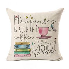 a pillow that says happiness is a cup of coffee and books