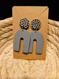 Cute drop earrings, great color combination! Bold Black Drop Earrings, Handmade Gray Dangle Earrings, Handmade Gray Drop Earrings, Gray Drop Earrings For Gift, Gray Drop Earrings, Gray Dangle Earrings For Pierced Ears, Gray Ear Wire Earrings For Gift, Gray Dangle Earrings With Ear Wire, Leopard Black