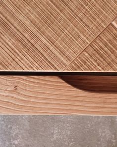 closeup of the wood grains on an unfinished piece of furniture