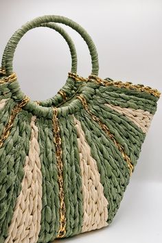 Front view of the Aurora Olive & Natural Woven Tote which features sage and natural woven braided fabric, gold thread details, round handles and sag lining Braided Fabric, Understated Glamour, Natural Weave, Braids With Weave, The Aurora, Gold Thread, Gold Threads, Modern Bohemian, Crochet Handbags