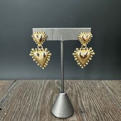 Modern and elegant with beaded trim, double heart earrings with an understated, novelty feel for Valentine's Day. Lightweight 2" drop 1" width Beaded Heart Earrings, Beaded Heart, Bead Bar, Druzy Necklace, Halo Earrings Studs, Double Heart, Beaded Trim, Statement Bracelet, Silver Earrings Studs