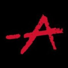 a red and black logo with the letter a in it's center on a black background