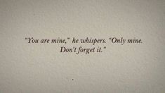 an old typewriter with the words you are mine, he whispers only mine don't forget it