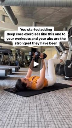 a woman is doing exercises on a yoga mat with dumbbells in front of her and the caption reads, you started adding deep core exercises like this one to your workout and