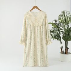 Experience elegance and comfort in our pastoral cotton nightgown, featuring double gauze layers, intricate lace, and bow details, perfect for stylish relaxation.