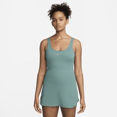 Up for a workout or down to chill, this slim-fitting dress is ready for whatever you are. Midweight, peachy-soft ribbed fabric stretches with your every move and dries quickly. Plus, built-in knit shorts with a left pocket offer both added coverage and storage. Spring Moisture-wicking Tennis Dress, Sporty Moisture-wicking Dresses For Spring, Fitted Moisture-wicking Dress For Workout, Moisture-wicking Fitted Workout Dress, Casual Workout Dress With Moisture-wicking Fabric, Casual Workout Dress With Moisture-wicking, Casual Sports Dress With Moisture-wicking, Casual Moisture-wicking Workout Dress, Fitted Tennis Dress For Gym In Spring