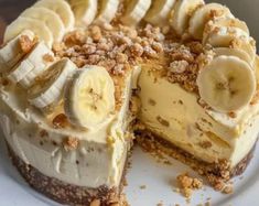 there is a cake with bananas on it and crumbs all over the top