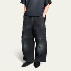 Balenciaga cargo pants with fading and distressing Regular rise Button and drawstring fastening Multiple pockets Full length Wide legs Cotton/polyester Made in Italy Urban Washed Black Cargo Pants With Belt Loops, Urban Washed Black Cargo Pants With Patch Pockets, Baggy Washed Black Cargo Pants With Hip Pockets, Urban Washed Black Cargo Pants, Urban Style Washed Black Pants With Hip Pockets, Urban Cargo Style Washed Black Bottoms, Straight Leg Washed Black Pants With Cargo Pockets, Washed Black Straight Leg Pants With Cargo Pockets, Wide Leg Washed Black Cargo Pants