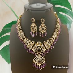 Luxurious Victorian Diamond Kundan Purple Beads Necklace with Parrots & Elephants along with earring's included with it. Elegant Purple Jewelry Set For Festive Occasion, Elegant Purple Kundan Necklace As Gift, Purple Round Beads Jewelry For Festive Occasion, Purple Beaded Jewelry For Festive Occasions, Elegant Purple Jewelry For Festivals, Beaded Chandbali Jewelry Sets For Gifts, Traditional Purple Beaded Jewelry, Traditional Purple Teardrop Jewelry, Purple Beads Necklace