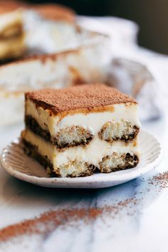 a piece of cake sitting on top of a white plate