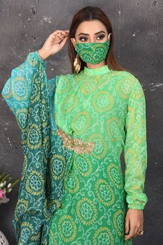 Elegant ombre green bandhej print Indowestern dress is a perfect party and festive wear. Shop designer dresses in USA from Pure Elegance. Navratri Long Sleeve Party Dresses, Bandhani Print Dupatta For Navratri Party, Navratri Party Wear Dresses With Long Sleeves, Navratri Party Dupatta With Bandhani Print, Navratri Party Bandhani Print Dupatta, Fitted Bollywood Bandhani Print Dress, Festive Bandhani Print Dupatta For Party, Festive Bandhani Print Party Dupatta, Multicolor Party Wear Dress For Navratri