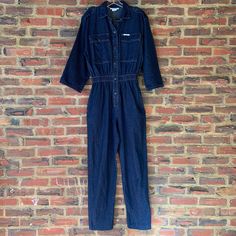 "Vintage 80s Large IDEAS Blue Denim jumpsuit overalls boiler suit snaps women's LABEL: IDEAS SIZE: Large FABRIC: Denim/Cotton (fabric has no stretch) CONDITION: great vintage COLOR: Blue Measurements: measured flat across-in inches  bust- 20\" waist-resting-13\" hips-21\" leg inseam-28\" waist to end of legs-2 arm inseam-16\"  shoulders across 17\" shoulder to crotch (from top of back of neck)-33\" overall length-60\" This CUTE Jumpsuit has snap closures- all snaps work.   There are 2 pockets wi Womens Overalls, Label Ideas, Jumpsuit Overalls, Boiler Suit, Vintage Color, Denim Cotton, Overalls Women, Denim Jumpsuit, Vintage Beauty