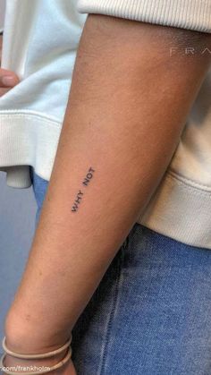 a person with a small tattoo on their arm that says, i love you mom