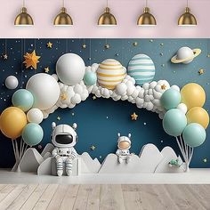 an astronaut themed wall mural in a children's room with balloons, stars and planets