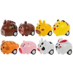 small plastic animal toy cars lined up in a row on a white background for display