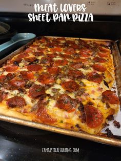 a pizza sitting on top of a pan covered in cheese and pepperoni toppings