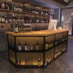 a bar with lots of liquor bottles on it