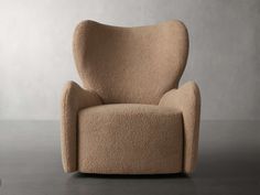 the chair is made out of wool and has a rounded shape