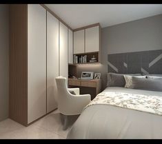 a bedroom with a bed, desk and chair