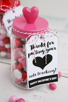 valentine's day candy in a jar with pink and red candies